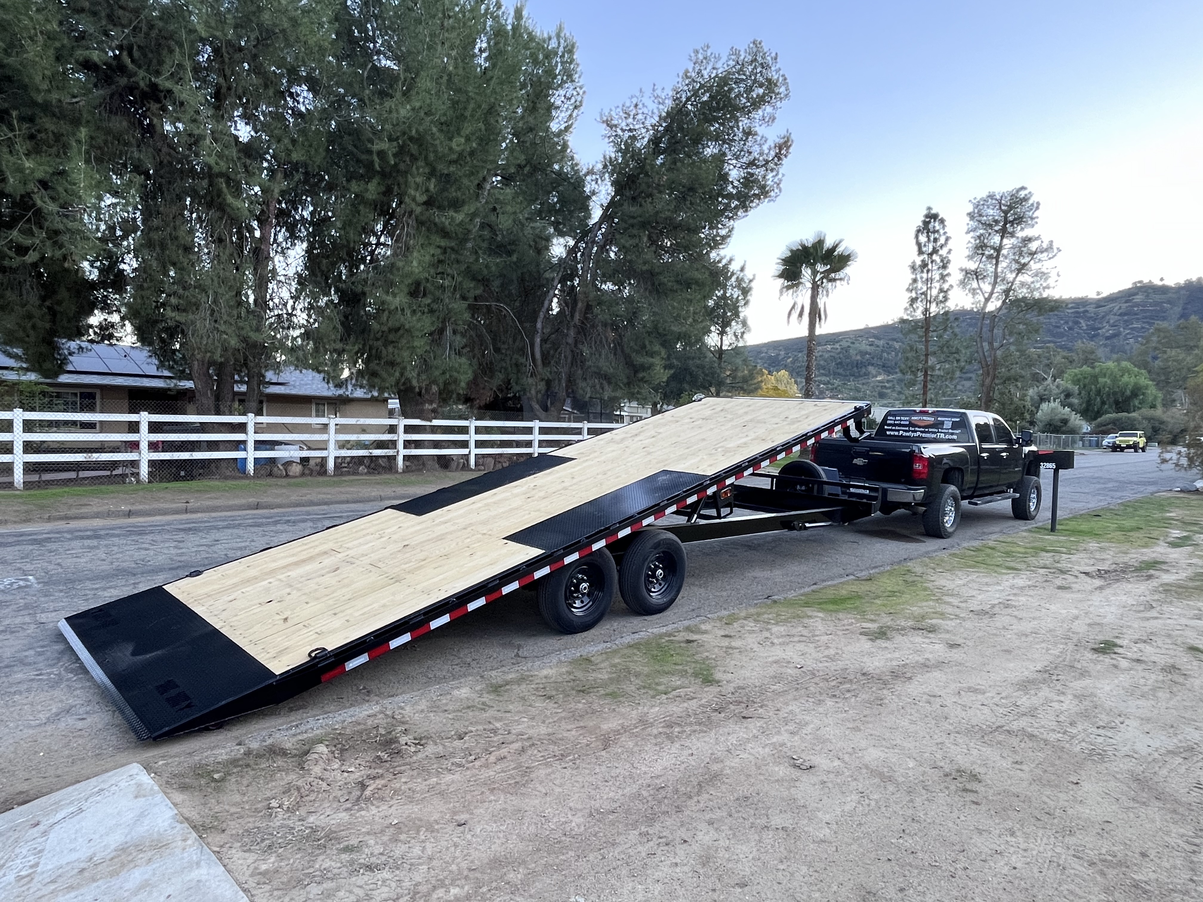 26 foot deckover tilt trailer rental in Wildomar CA with 9000 lb capacity for heavy equipment